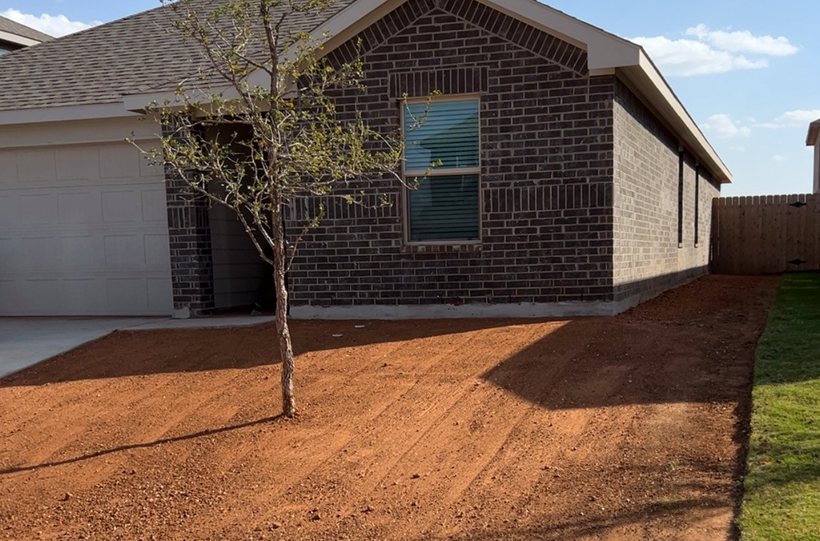 Residential final grading before sod at a new Lubbock home