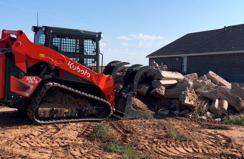 Concrete removal and heavy debris cleanup with skid steer